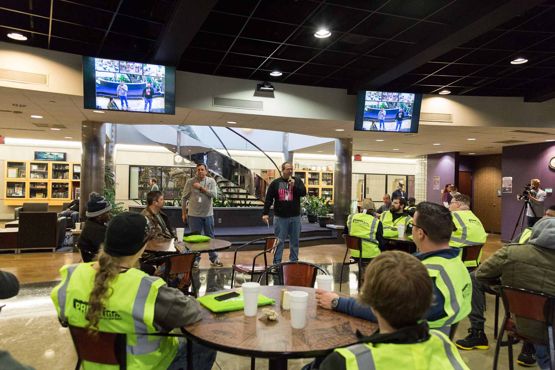 A Prime associate leads a team meeting.