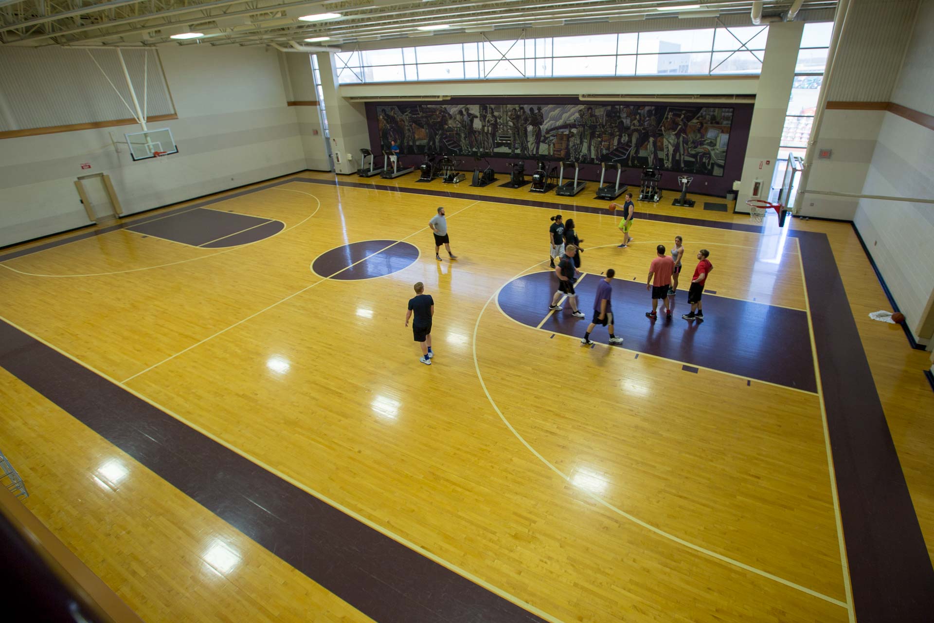 Prime associates enjoy a basketball game at Prime's full-size basketball court.